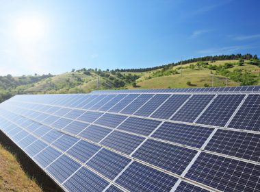 Solar panels on a hill.